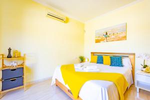 Posteľ alebo postele v izbe v ubytovaní Bungalow Rosa - PlusHolidays