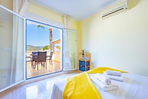 Posteľ alebo postele v izbe v ubytovaní Bungalow Rosa - PlusHolidays