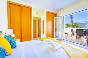 Posteľ alebo postele v izbe v ubytovaní Bungalow Rosa - PlusHolidays + 37 fotografií