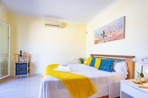 Posteľ alebo postele v izbe v ubytovaní Bungalow Rosa - PlusHolidays