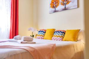 Posteľ alebo postele v izbe v ubytovaní Bungalow Rosa - PlusHolidays