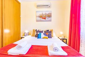 Posteľ alebo postele v izbe v ubytovaní Bungalow Rosa - PlusHolidays