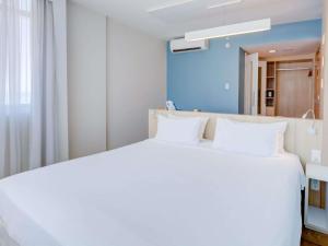 Cama o camas de una habitación en Mercure Rio de Janeiro Barra da Tijuca