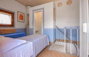 Ένα ή περισσότερα κρεβάτια σε δωμάτιο στο Awesome Home In Roma With Wifi