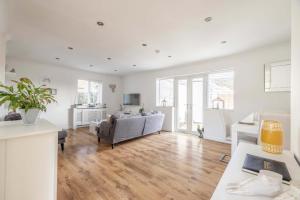 a living room with a couch and a table at Host & Stay - Meadow Way in Windsor