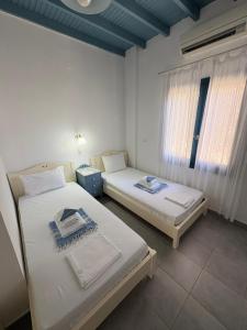 Posteľ alebo postele v izbe v ubytovaní Sofia Rooms