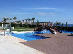 Bazén v ubytování Encantador apartamento con piscina y jardín a 200m de la playa, San Juan de los Terreros - ES-376-20 nebo v jeho okolí