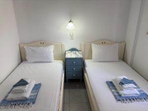Posteľ alebo postele v izbe v ubytovaní Sofia Rooms