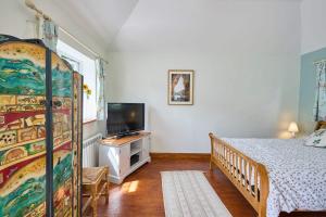 Ένα ή περισσότερα κρεβάτια σε δωμάτιο στο Host & Stay - The Lodge