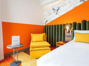 Postel nebo postele na pokoji v ubytování Mercure Shéhérazade Rabat