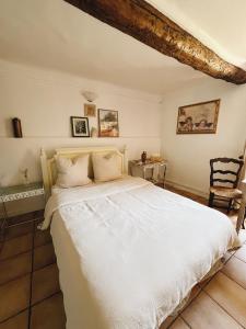 Postel nebo postele na pokoji v ubytování La Bastide des Pins