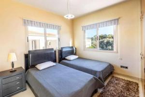 En eller flere senge i et værelse på Villa Green Valley 3 + 23 billeder