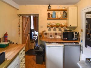 Kuchyň nebo kuchyňský kout v ubytování Harebeck Cottage + 12 fotografií