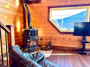 TV a/nebo společenská místnost v ubytování Ski Chalet - Mountain and Spa - Chalet Heritage