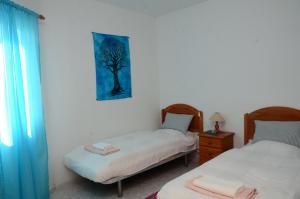 Ένα ή περισσότερα κρεβάτια σε δωμάτιο στο Apt Berit