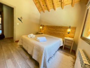 Postel nebo postele na pokoji v ubytování Remanso del Bosque - Maiten Cabin