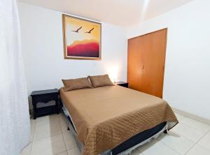 Postel nebo postele na pokoji v ubytování Hostal Casa Coliving Medellin
