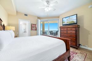 Voodi või voodid majutusasutuse Beach Colony Tower Unit 18D toas