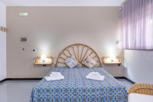 Una cama o camas en una habitación de A casa di Pietro Due