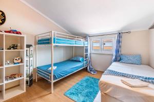 Ένα ή περισσότερα κρεβάτια σε δωμάτιο στο Zen Village Rosa +27 φωτογραφίες