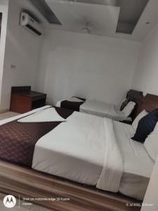 Postel nebo postele na pokoji v ubytování Hotel The Best Delhi International Airport