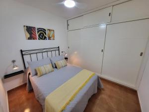 Ένα ή περισσότερα κρεβάτια σε δωμάτιο στο Apartamento Caray