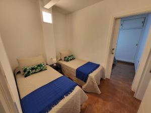 Ένα ή περισσότερα κρεβάτια σε δωμάτιο στο Apartamento Caray +6 φωτογραφίες