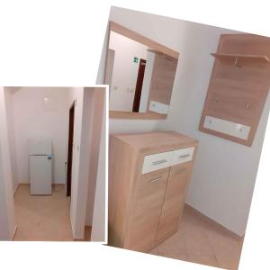 Un baño con espejo y mueble de madera. en Apartment Lopar 9, en Lopar
