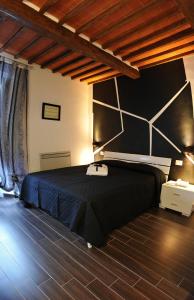 سرير أو أسرّة في غرفة في Bed & Breakfast Viziottavo