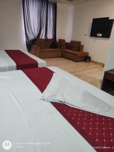 Postel nebo postele na pokoji v ubytování Hotel The Best Delhi International Airport