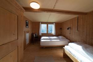 Postel nebo postele na pokoji v ubytování Sigerst