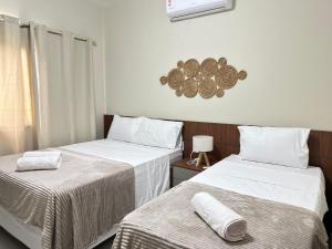 Postel nebo postele na pokoji v ubytování Chalet Paraíso Lençóis Santo Amaro