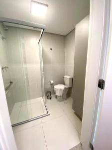 a bathroom with a shower and a toilet at Apartamento Aconchegante na Vila Mariana in Sao Paulo +29 photos