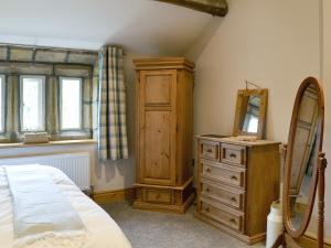 En eller flere senge i et værelse på Little Grans Cottage + 6 billeder
