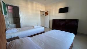Katil atau katil-katil dalam bilik di Hotel Le Gardenia (ex Lutetia)