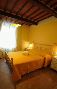 سرير أو أسرّة في غرفة في Bed & Breakfast Viziottavo