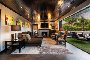 a living room with a couch and a fireplace at New Listing Burbank Bungalow by Colby&Conrad in Los Angeles +56 photos