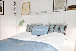 Postel nebo postele na pokoji v ubytování 8806-Hvide-Sande-Ae-Gammel-Havn-15