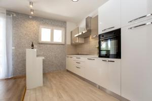 Kuchyňa alebo kuchynka v ubytovaní Apartment in Rovinj - Istrien 11487
