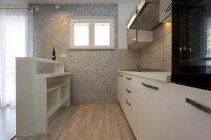 Kuchyňa alebo kuchynka v ubytovaní Apartment in Rovinj - Istrien 11487
