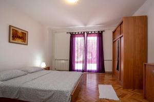 Posteľ alebo postele v izbe v ubytovaní Apartment in Rovinj - Istrien 11487