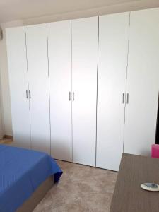 Postel nebo postele na pokoji v ubytování La Frisaia Appartamento B1