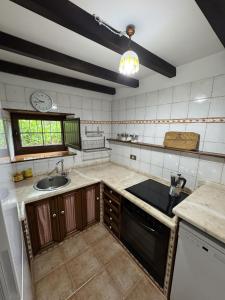 Kuchyň nebo kuchyňský kout v ubytování Casa vacacional Pilar