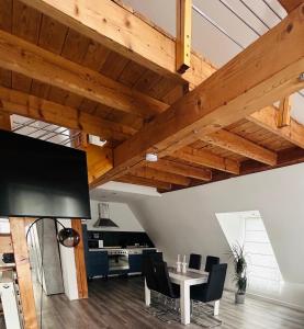 TV a/nebo společenská místnost v ubytování Ferien- Monteurwohnung