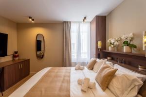 Ένα ή περισσότερα κρεβάτια σε δωμάτιο στο Sol hotel St Mande - 2 personnes - 22
