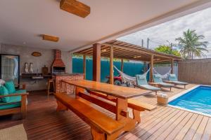Bazén v ubytování Casa Espaçosa com Piscina e Sauna Privativa! 6 Suítes! nebo v jeho okolí