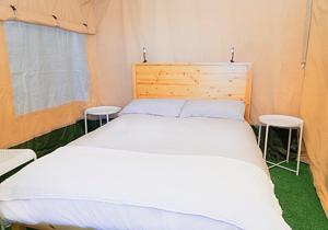 Glamping Safari Style 객실 침대