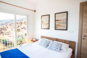 Postel nebo postele na pokoji v ubytování Conti Houses + 21 fotografií