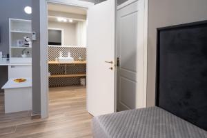 Η κουζίνα ή μικρή κουζίνα στο Dimora Neapolis +143 φωτογραφίες