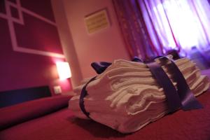 سرير أو أسرّة في غرفة في Bed & Breakfast Viziottavo